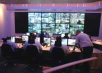an office where it has a lot of monitors, where it is observed by people