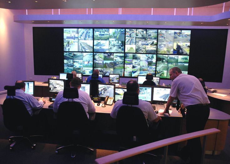 an office where it has a lot of monitors, where it is observed by people